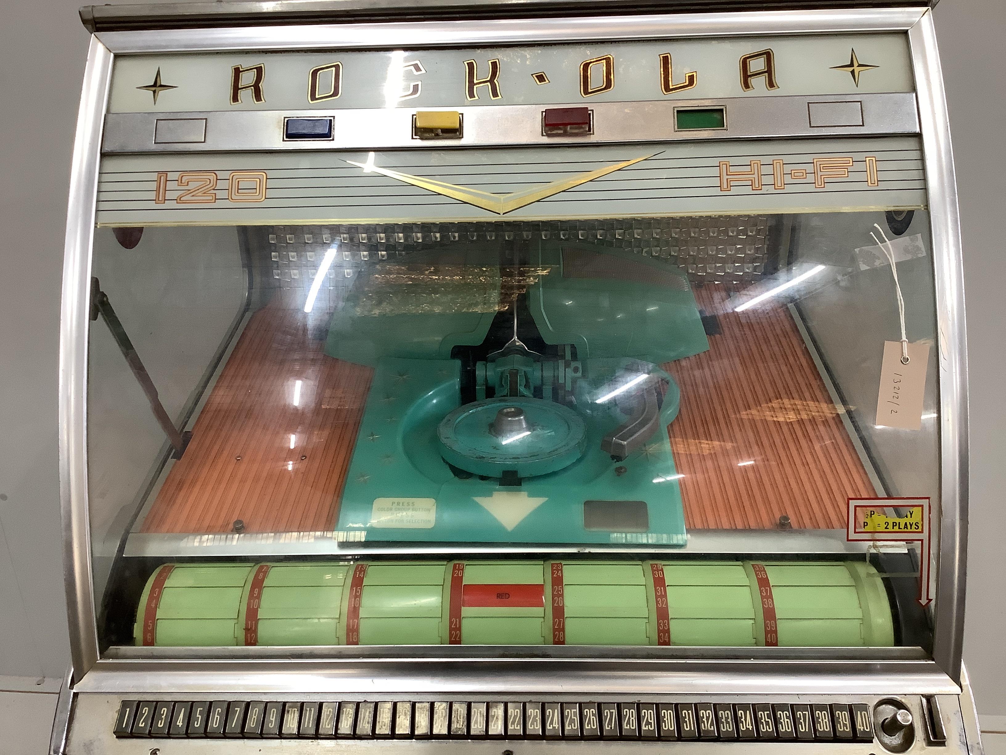 A mid century Rock. Ola 120 hi-fi juke box, amp rebuilt and refurbished, width 77cm, depth 69cm, height 141cm